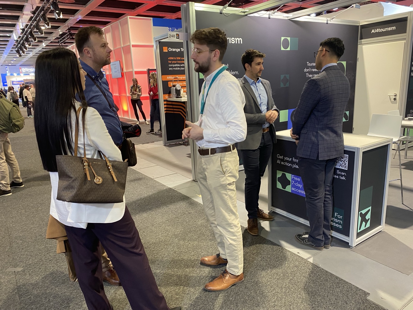 The AI4tourism stand at ITB Berlin 2026 (Hall 6.1, Stand 248) – “From AI confusion to clear action” | Conversation at the AI4tourism stand at ITB Berlin 2026 | The AI4tourism stand in Hall 6.1 of ITB Berlin, with visitors | Visitors at the AI4tourism stand at ITB Berlin 2026 | Presenting the AI4tourism solution at the ITB Berlin 2026 stand